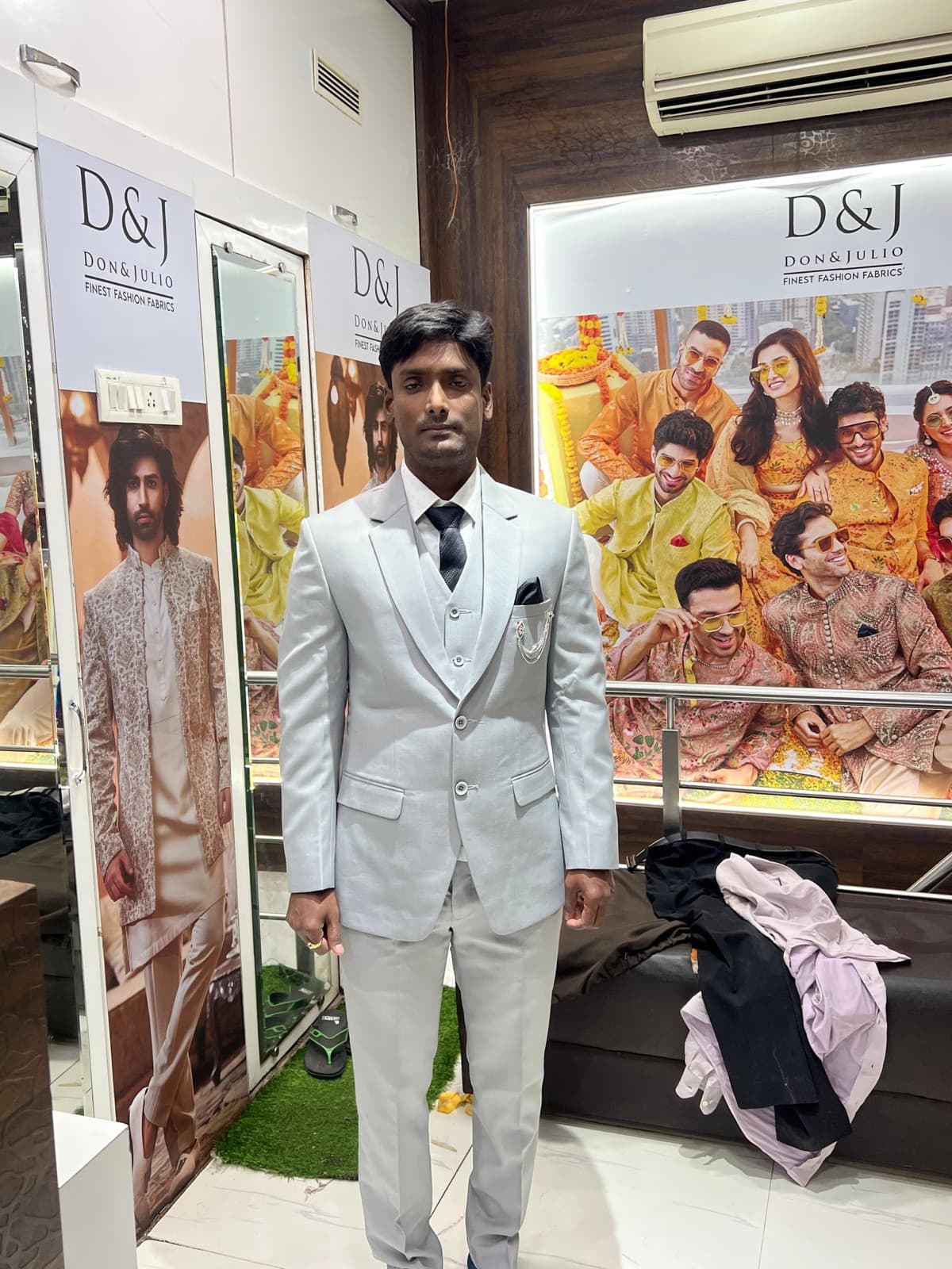 Light grey three-piece suit